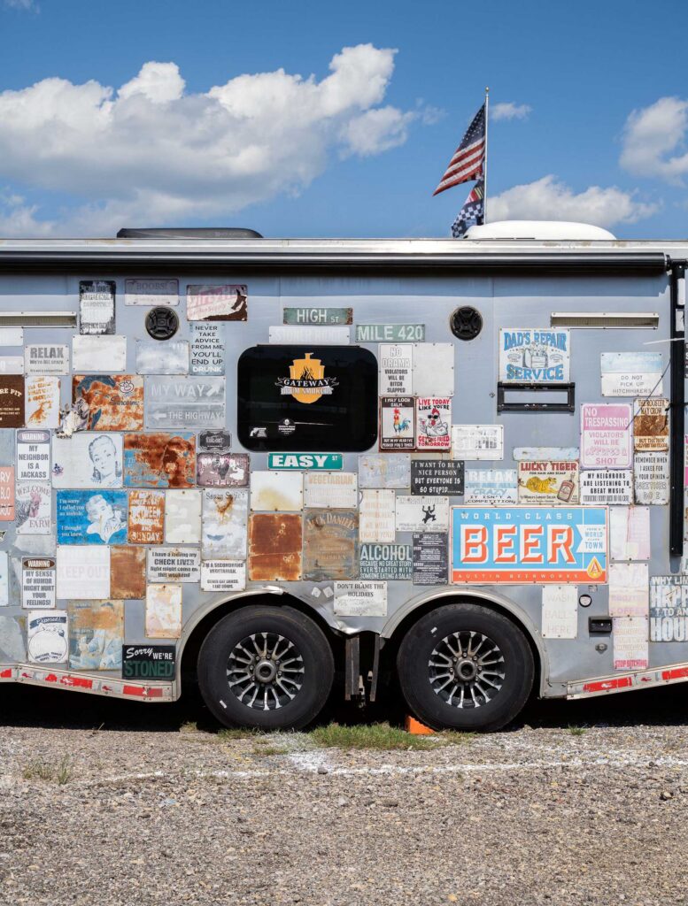A trailer carries decades of racing signs and souvenirs.