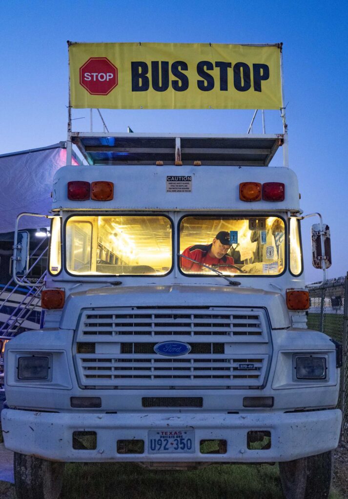 A repurposed bus becomes a race-week home.