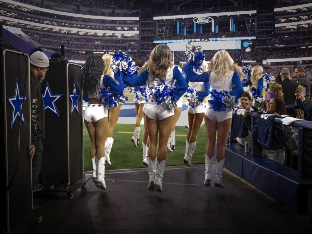The squad enters the field at AT&T Stadium.