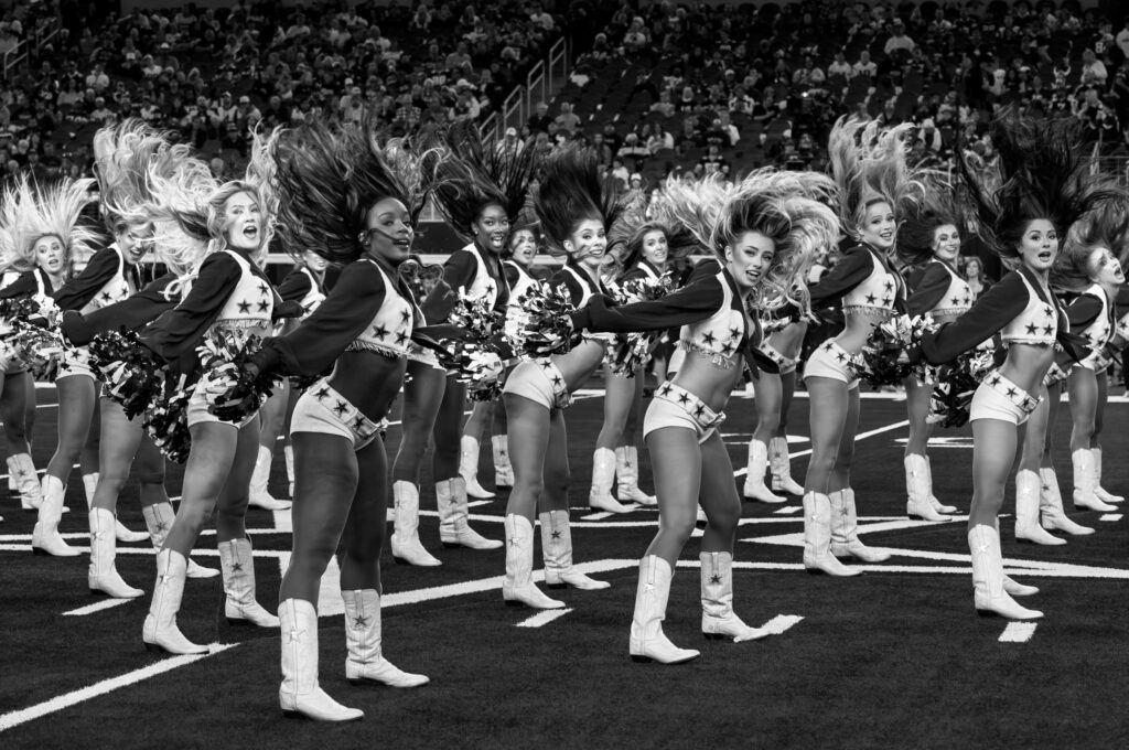 Hair flips across the field.