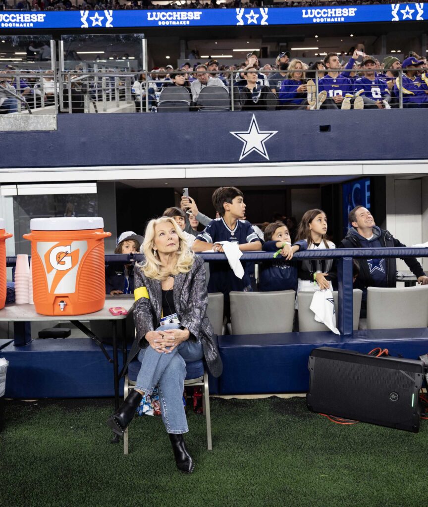 A quiet sideline moment during the game.